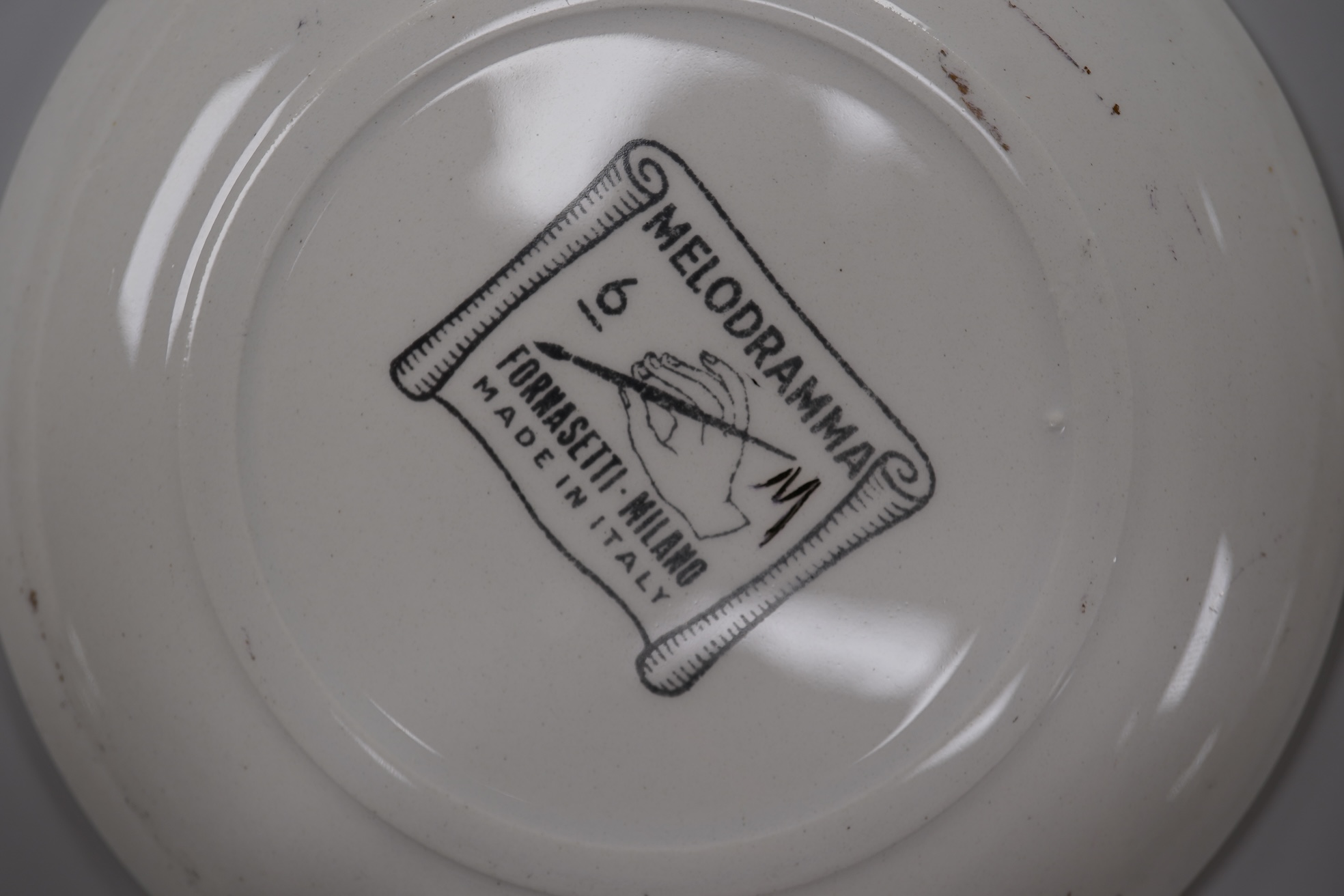 Fornasetti, a group of five operatic coasters, ‘Melodramma’ to include Otello and Desdemona, 10cm in diameter